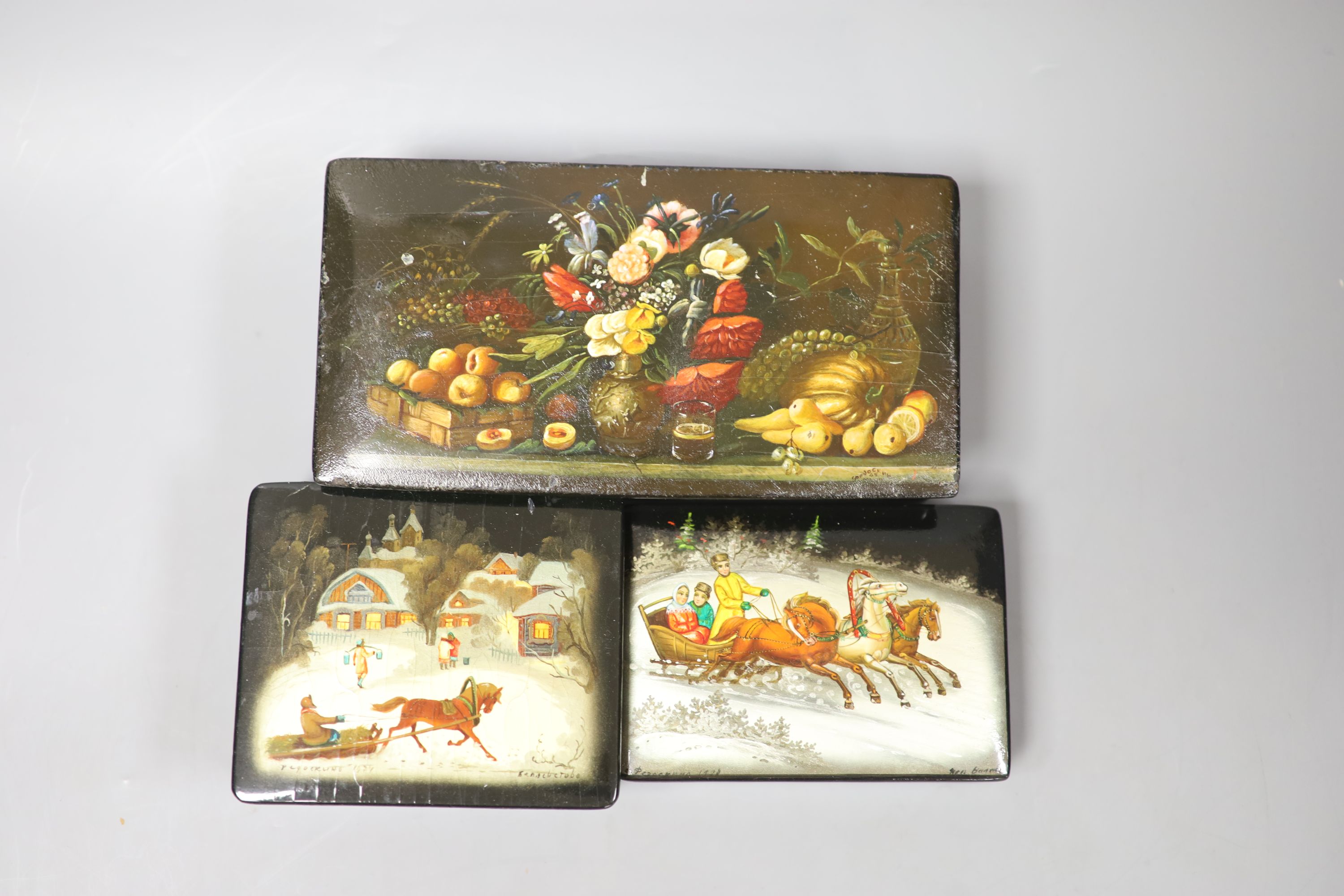 Twelve Russian or Persian Papier mache boxes